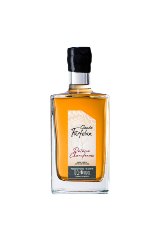 Bouteille de 70 cl de Ratafia Champenois, étiquette "Claude Farfelan", liquide ambré.